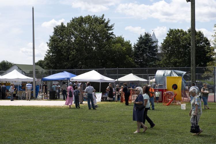 Cornhole and carvings scenes from the 15th annual Bowmansville Days