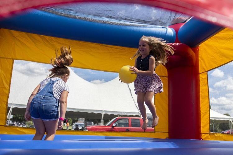 Cornhole and carvings scenes from the 15th annual Bowmansville Days