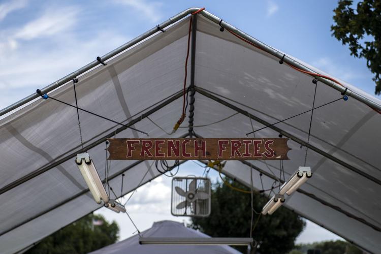 Cornhole and carvings scenes from the 15th annual Bowmansville Days