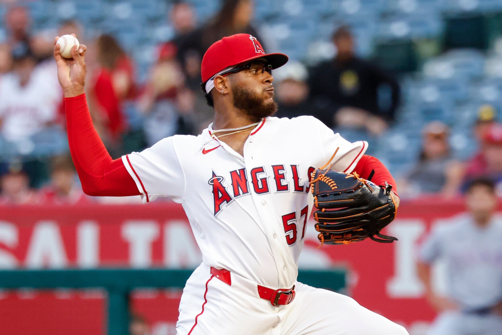 Ureña pitches Angels past Rangers 7-0 as Trout and Guzman lead