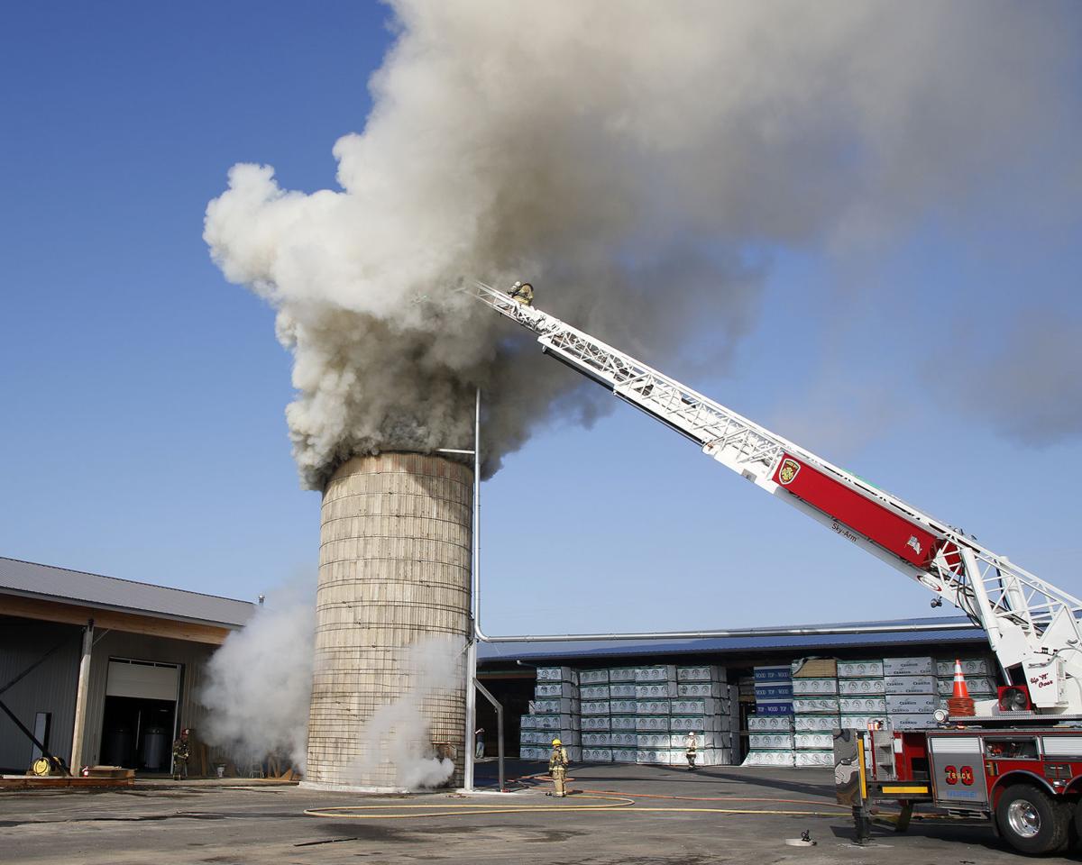 Fire strikes silo filled with wood chips in Earl Twp. Local News