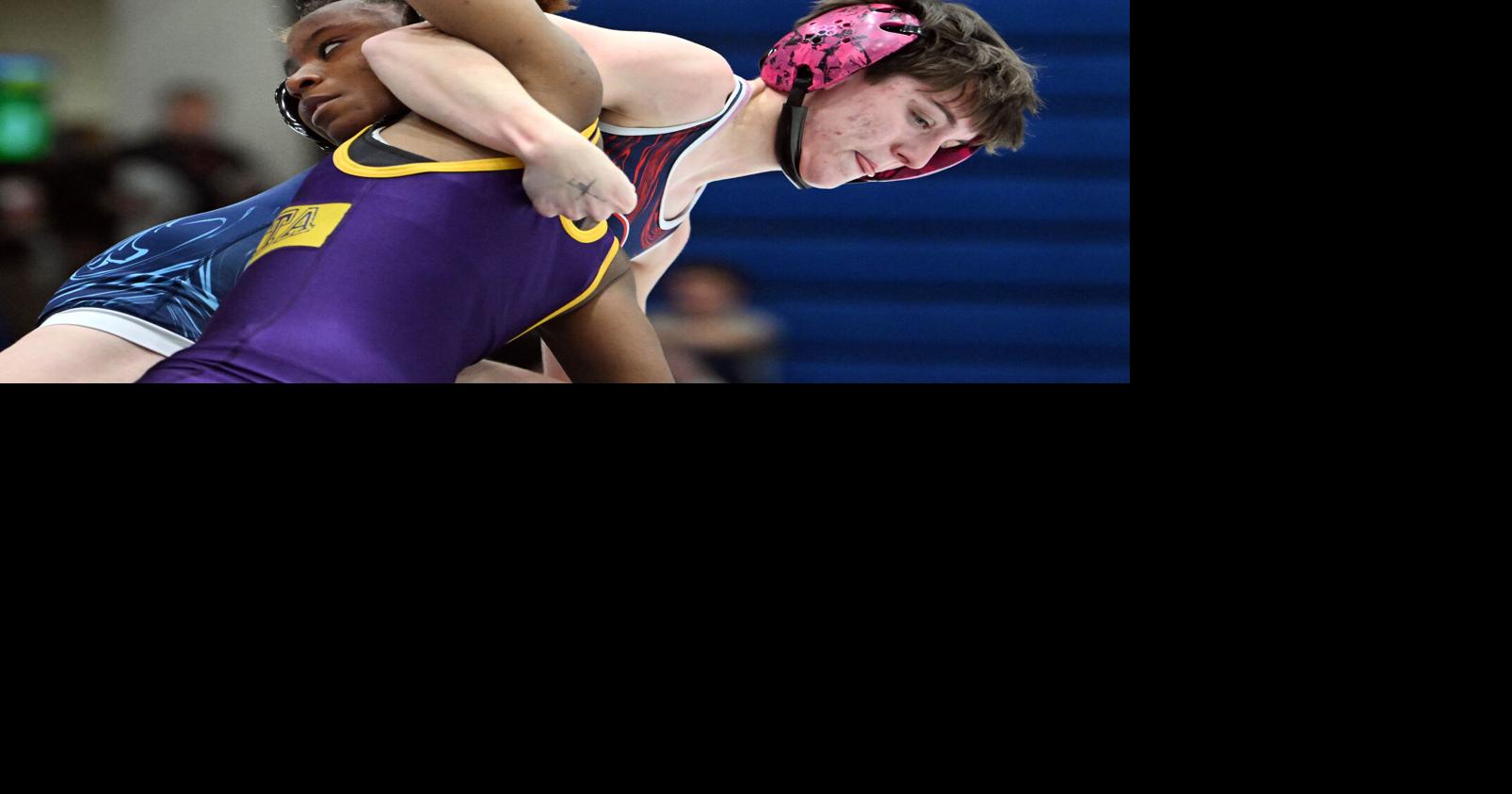 Two-time medalist at World Wrestling Championships visits with competitors at L-L League girls tournament