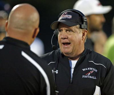 football manheim central league warwick lancasteronline school ll sidelines locker coach bob takes half action head during team