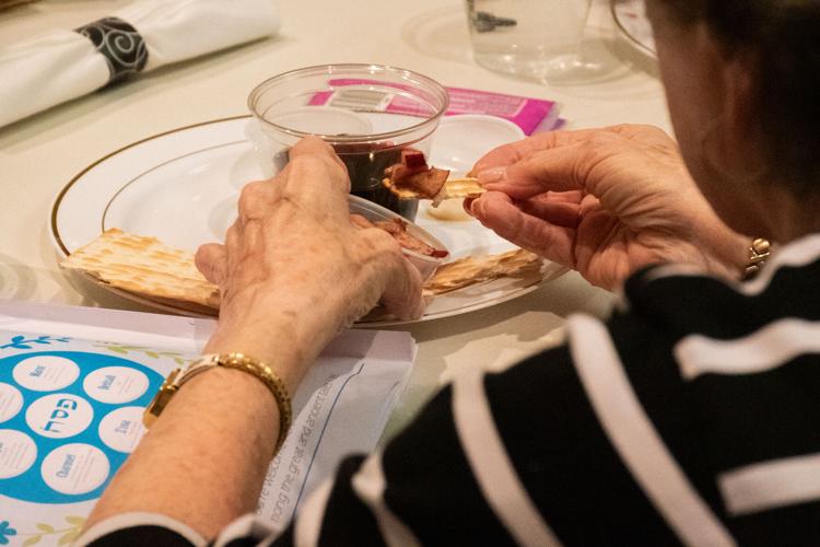 Model Sader Members of the Jewish community hold model Seder at Masonic Village ...