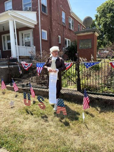 Lancaster residents gather by George Ross Monument for reading of ...