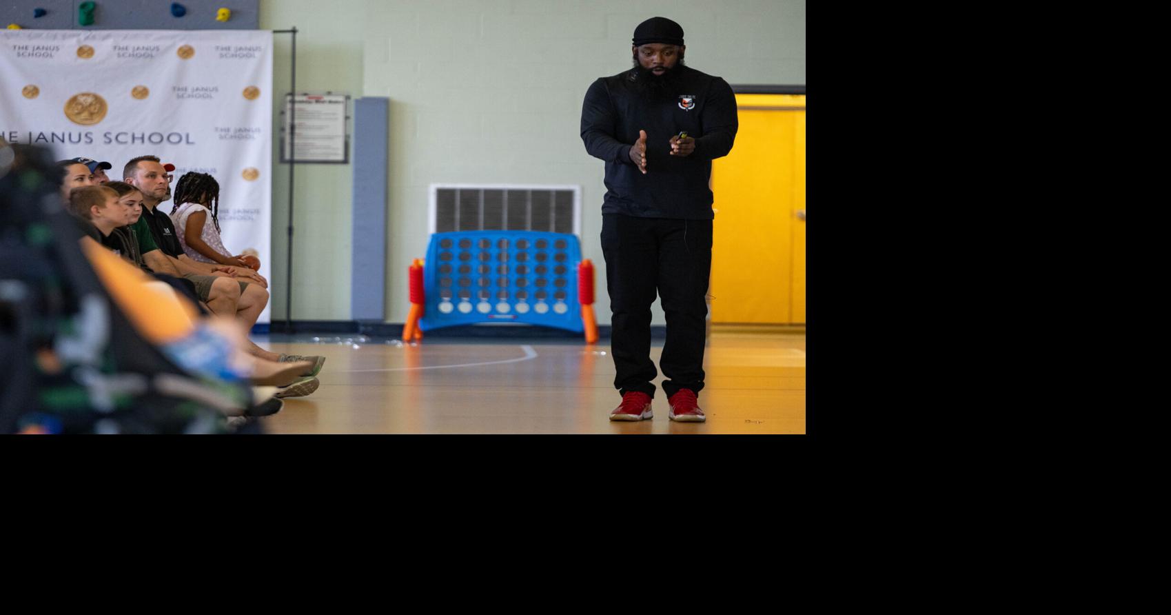 Former NFL player shares his battle with dyslexia in visit to Janus ...