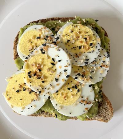 Toast with avocado, hard-boiled eggs and everything bagel seasoning