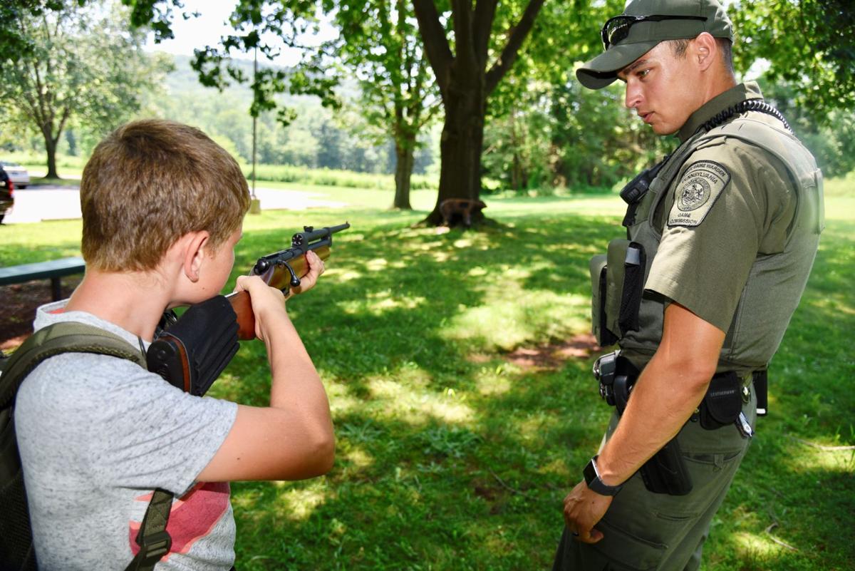 Game Warden Camp Creek teaches youngsters about role of ‘thin green