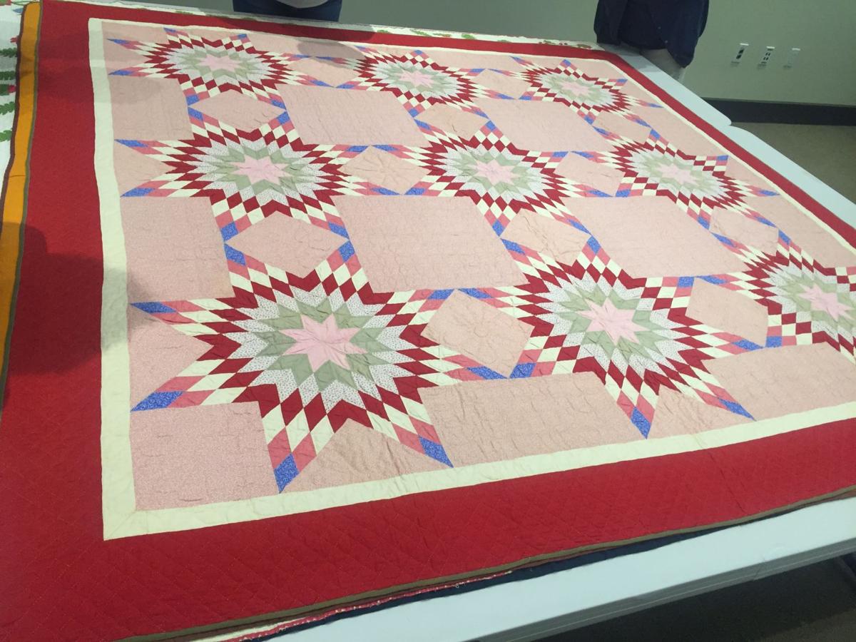 This vintage block quilt is still red, white and blue 100 years later