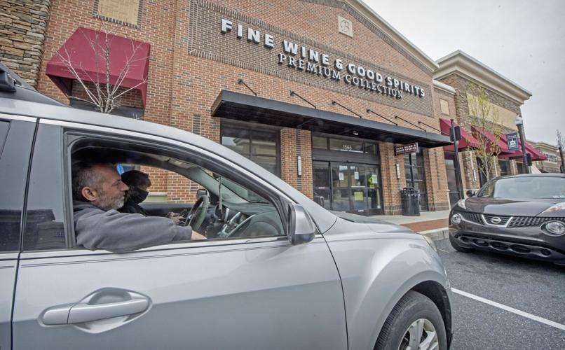 Curbside liquor sales get off to a slow start Monday at Fine ...