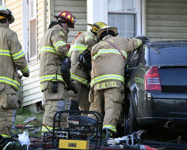 Driver rescued from vehicle after crashing into porch in Warwick ...