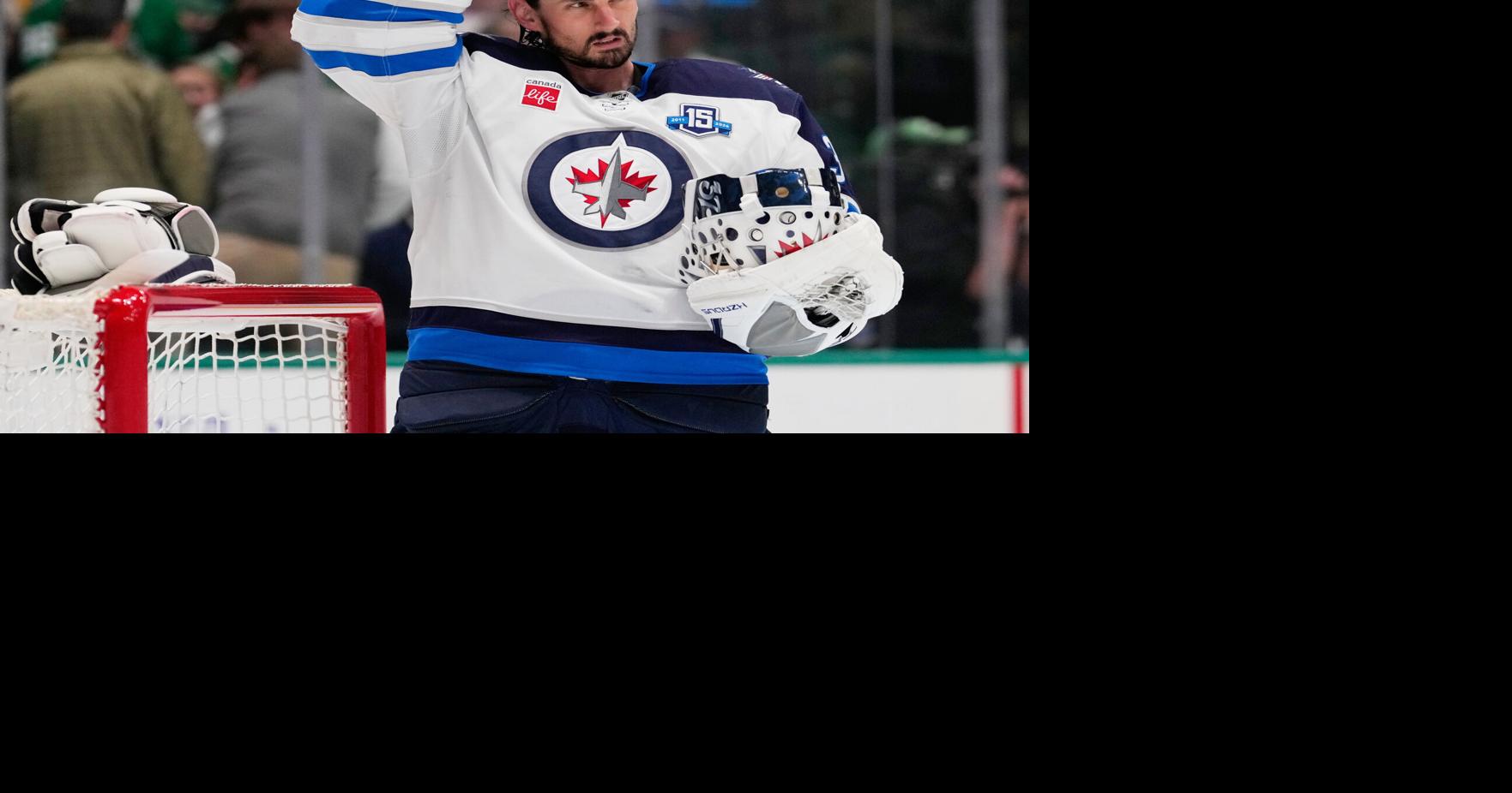 Connor Hellebuyck happy to be with the Devils after a long wait for a trade from the Jets