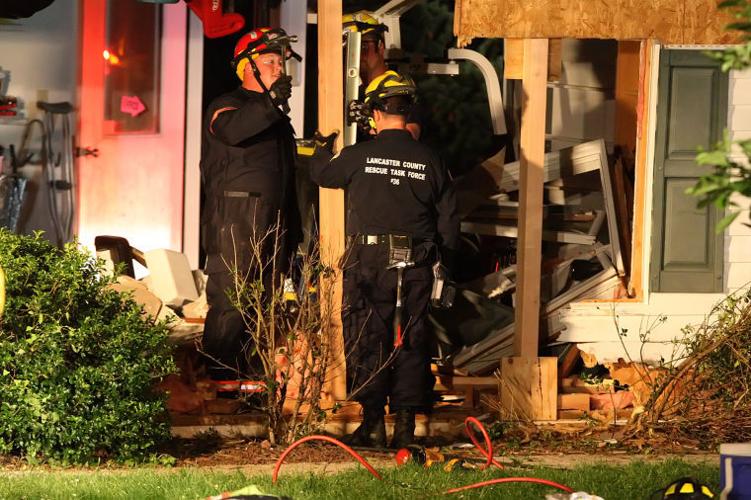 House severely damaged after car crashes into garage; driver injured ...