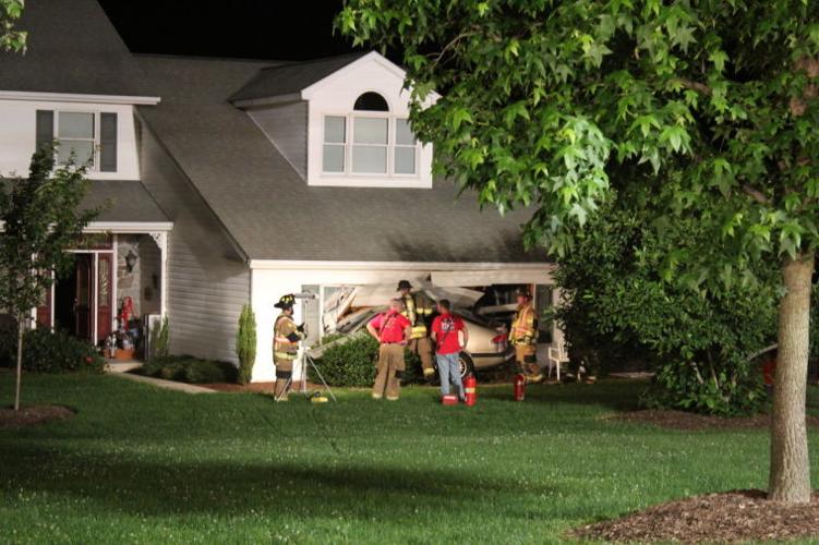 House severely damaged after car crashes into garage; driver injured ...