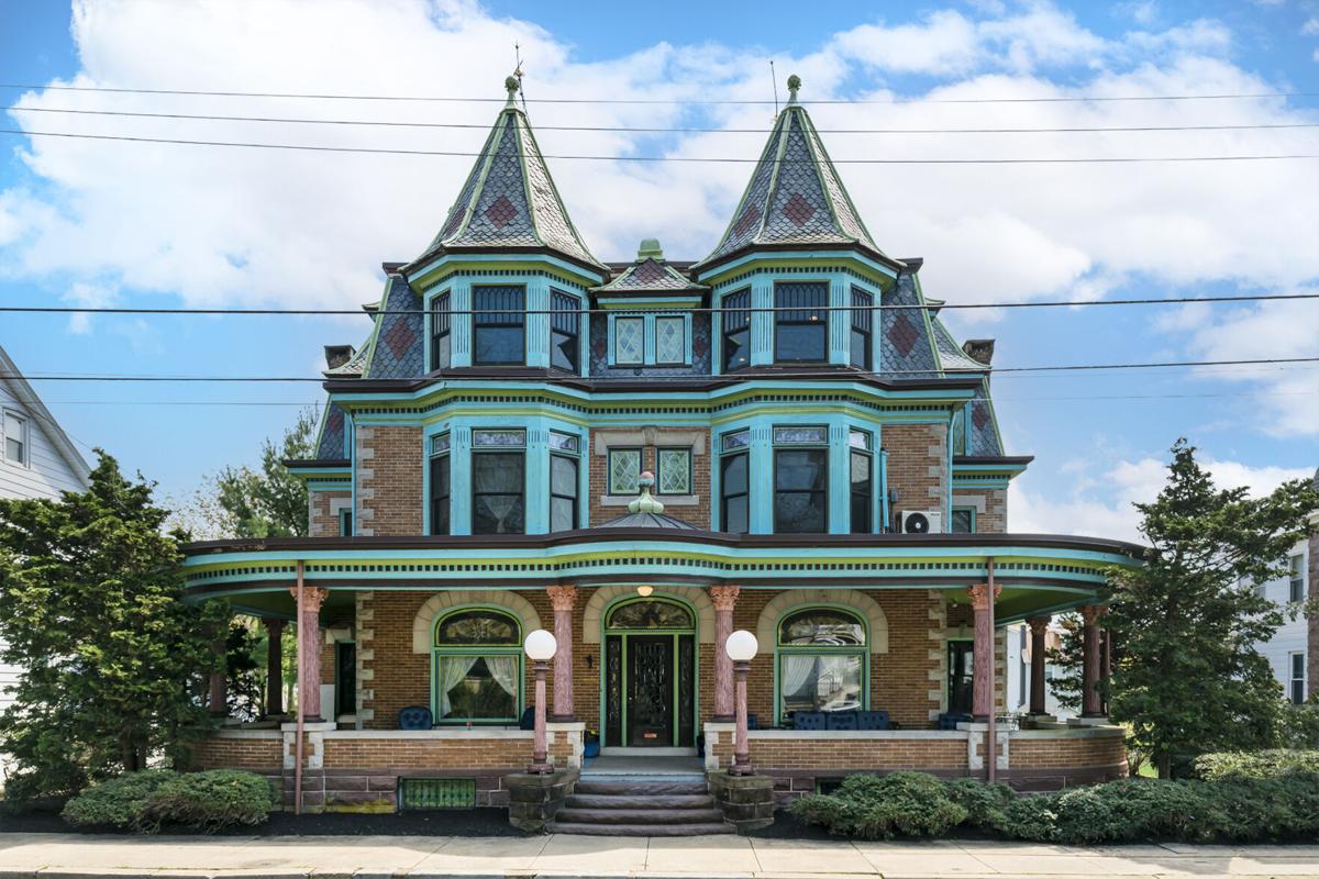 This Adamstown home for sale has 9 bedrooms, original woodwork and an