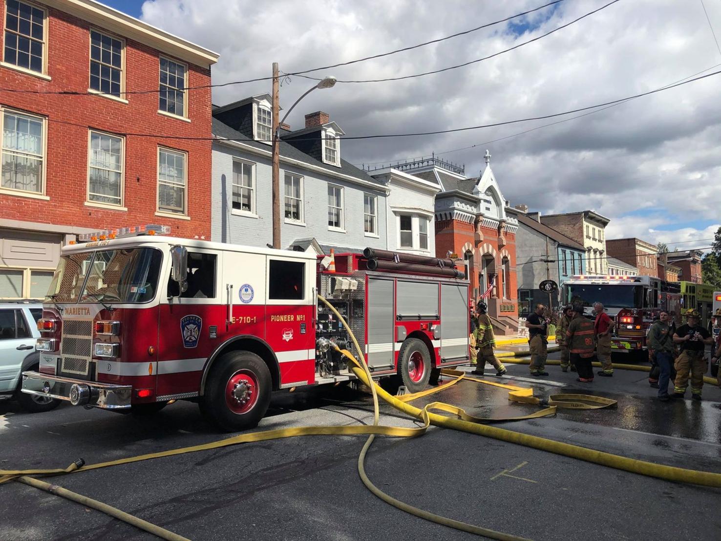 Crews fight fire at apartment building in Marietta on Friday afternoon