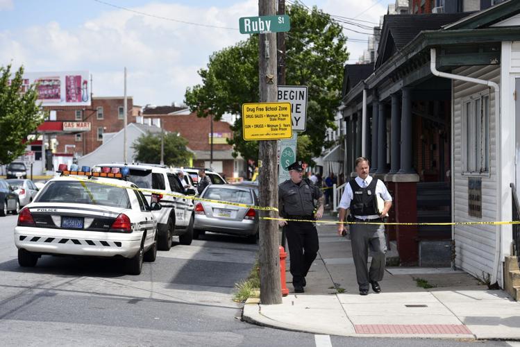 Police arrest two in connection with Columbia Ave. shooting that left ...