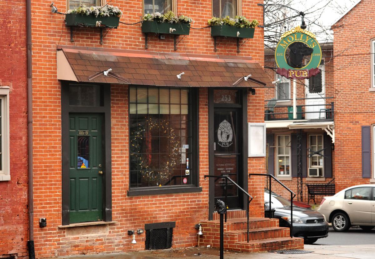 As owner faces assault charges, liquor license expires for Molly's Pub