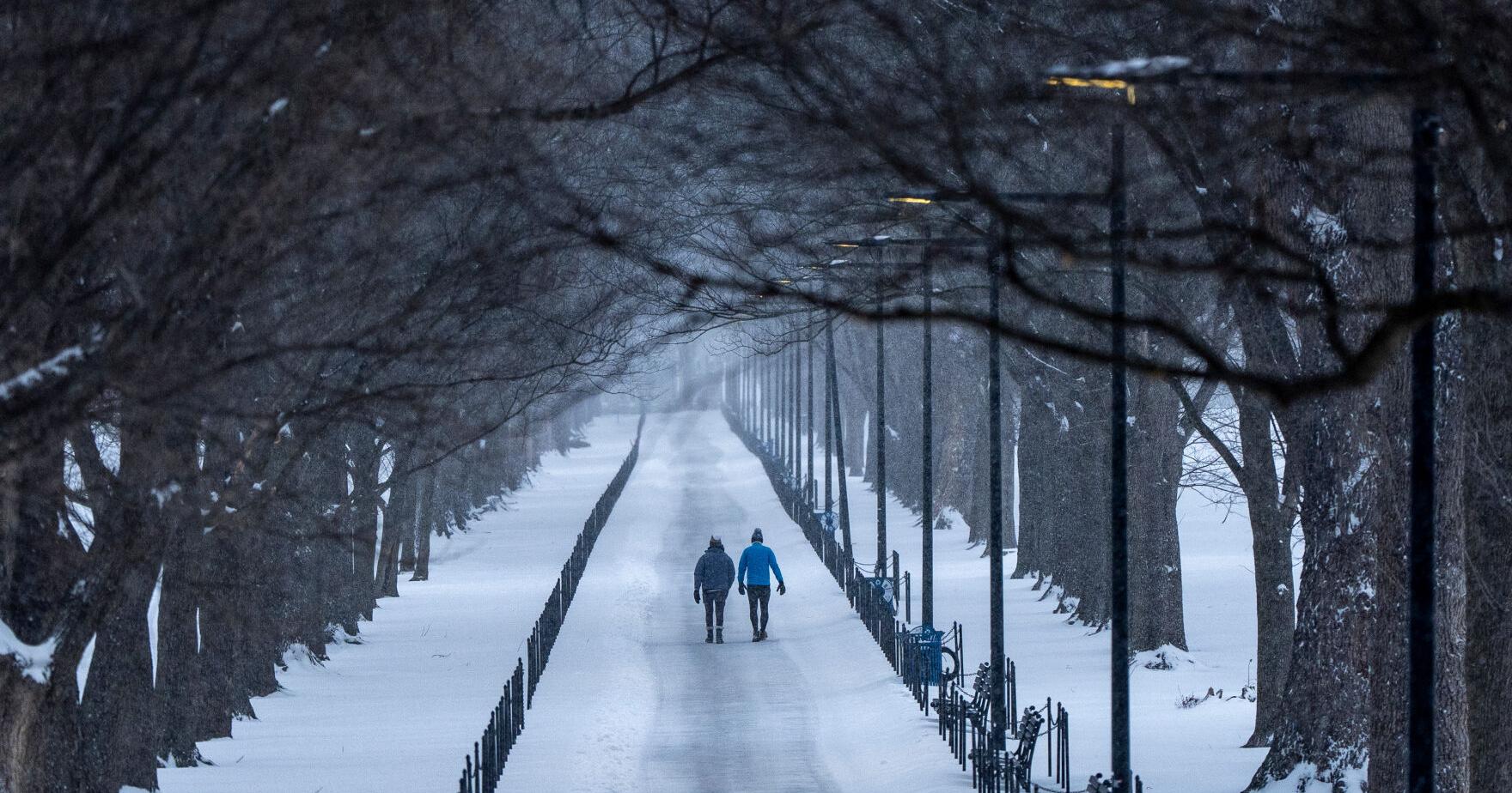Massive winter storm dumps sleet , freezing rain and snow around much of US