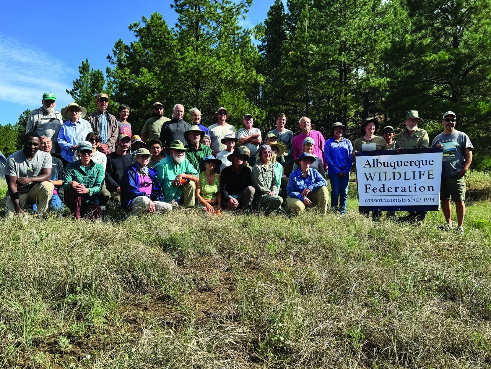 Volunteers work to reduce erosion along Manuelitas Creek