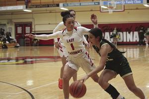 Top ranked Cards lock in and beat Lady Dons