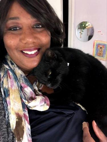 Black cat is back home after 5 years on the run