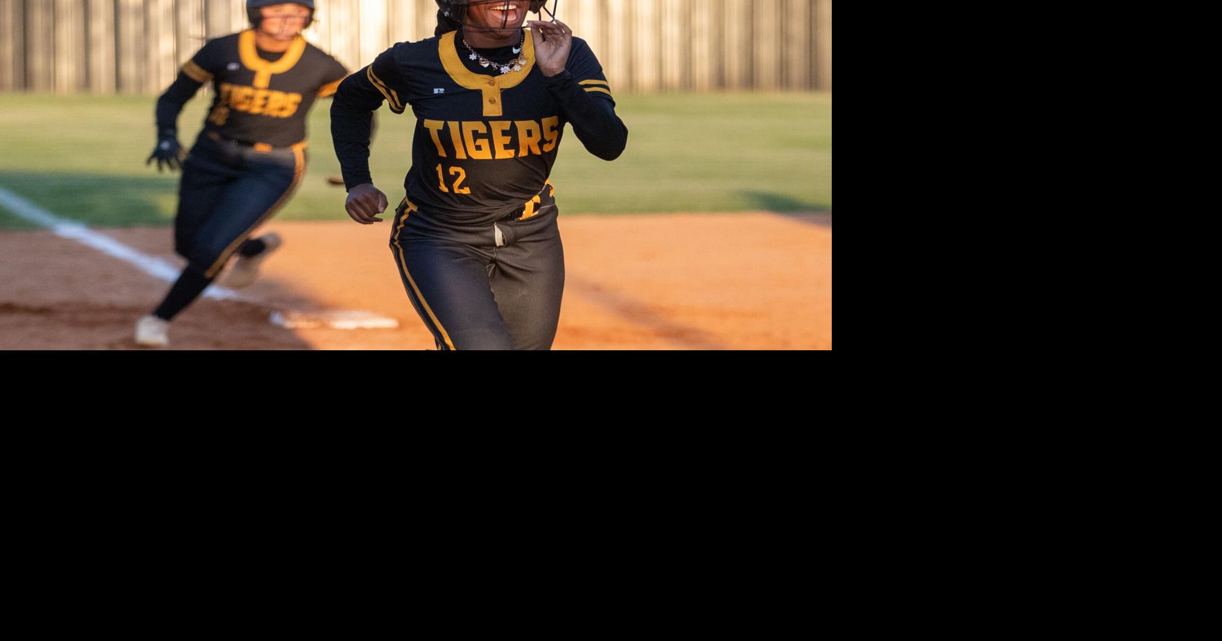 Lady Tigers all smiles after capturing back-to-back region titles ...