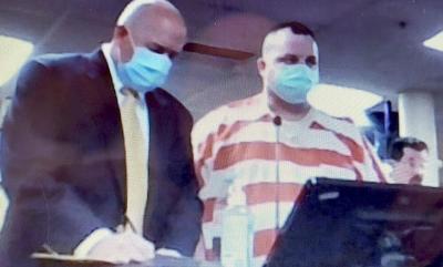 Defendant Chad Joel Graves with attorney T. Michael Reed in Forrest County Circuit Court via Zoom.