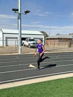Track and field teams split up for meets