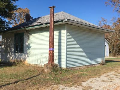 Board Considers Options For Reroofing Twin Oaks Gas Station