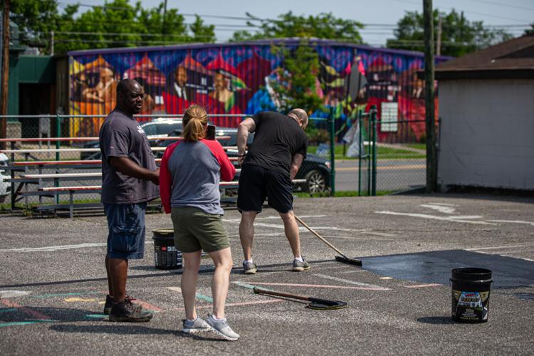 Court resurfacing at Scott Community Center aims to bring back summer