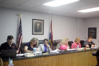 Winfield’s Board of Alderman pours through several ordinances during its monthly meeting May 11.