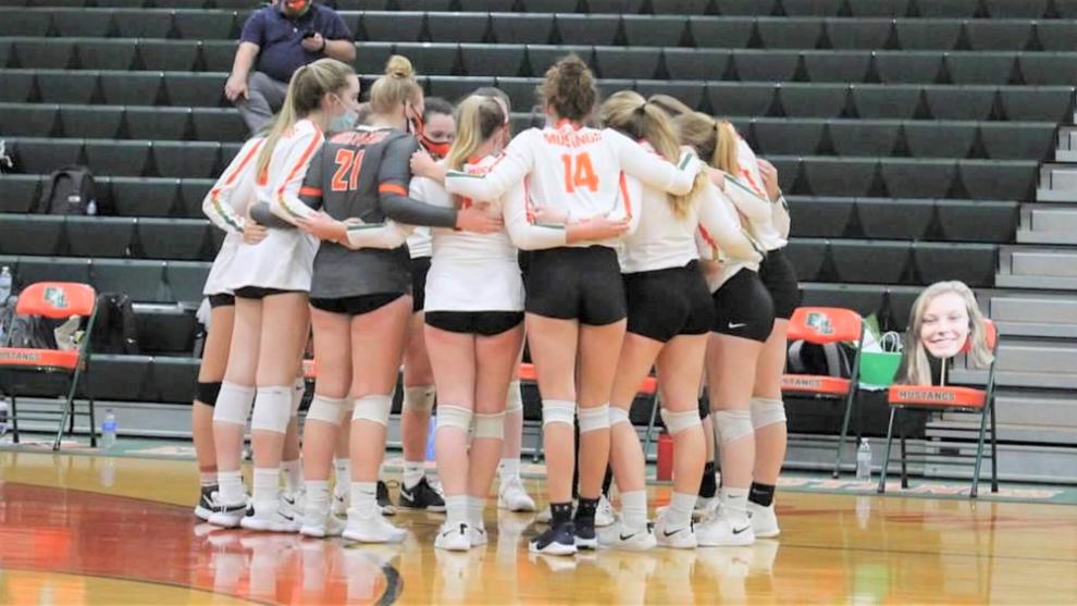 Lady Mustangs Volleyball Team Huddle