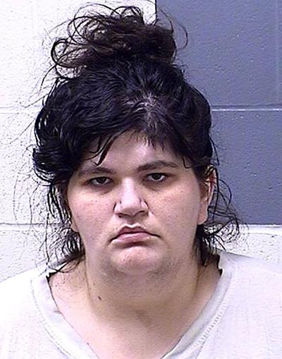 Woman charged in fatal Normal Hill crash