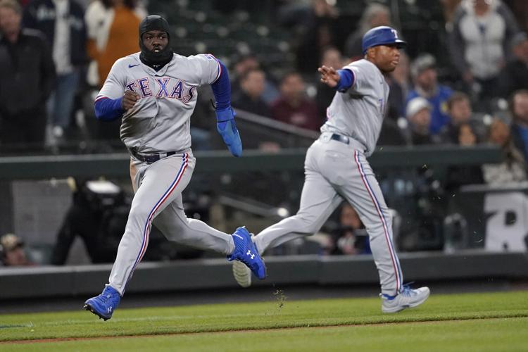 Rangers' streak at 10 with 5-1 win in Seattle