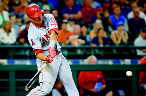 Kole Calhoun scores on wild pitch to push Angels past Mariners in