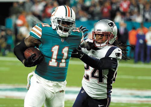 Brady intercepted twice as Dolphins beat Pats 27-20