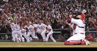 Braves fan hurts himself trying to catch Albert Pujols home run (GIF)