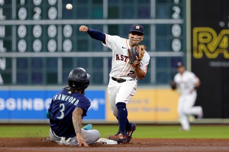 Astros' Javier pitches in coffee-stained uniform after pregame