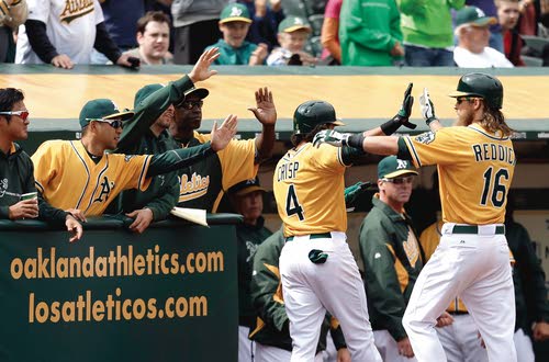 Oakland Athletics' Coco Crisp swings for a double against the