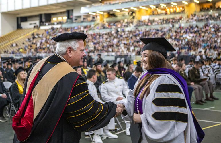 UI grads ready for next chapter, rain or shine