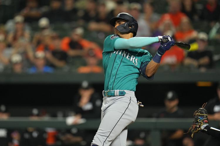 Mariners score 7 in the 8th to cap a 13-1 win overOrioles