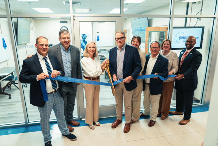 Participating in the ribbon cutting are (left to right) Dr. Andy White, CSCC President; Dr. John Squires, CSCC Vice President of Economic and Institutional Development; Julia Johnson Scoggins, Mark Johnson, and Beverly Johnson with the George R. Johnson...