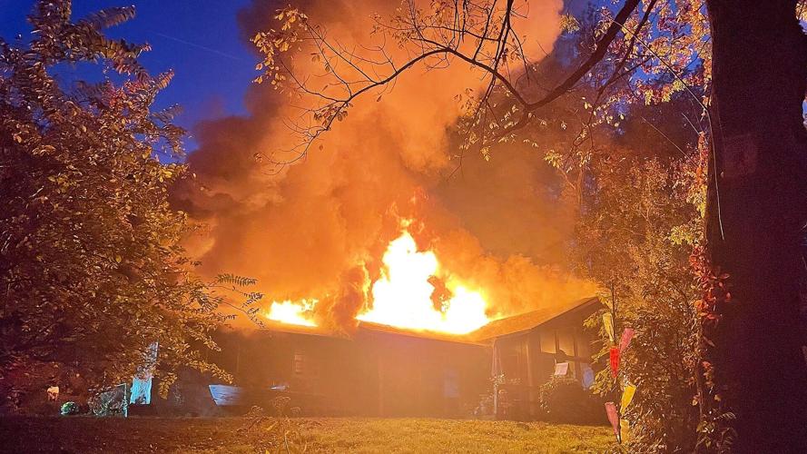 Early morning house fire destroys Suck Creek home, despite firefighters ...