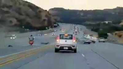 CAUGHT ON CAMERA: Motorcyclist kicks car and causes multi-car crash ...