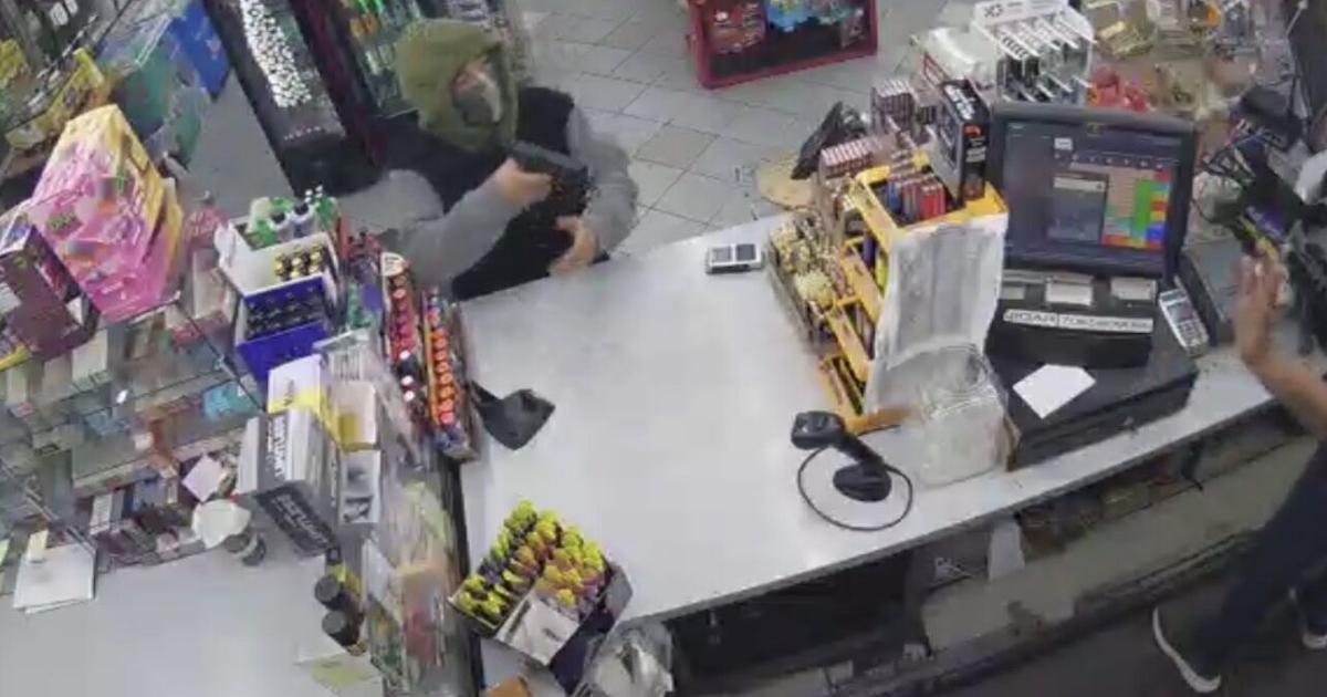 Clerk speaks out after being held at gunpoint during armed robbery at Cleveland convenience store; suspect still at large