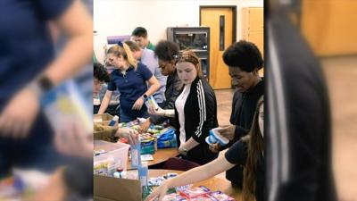 MAKING A DIFFERENCE: Bethel students send care packages to soldiers