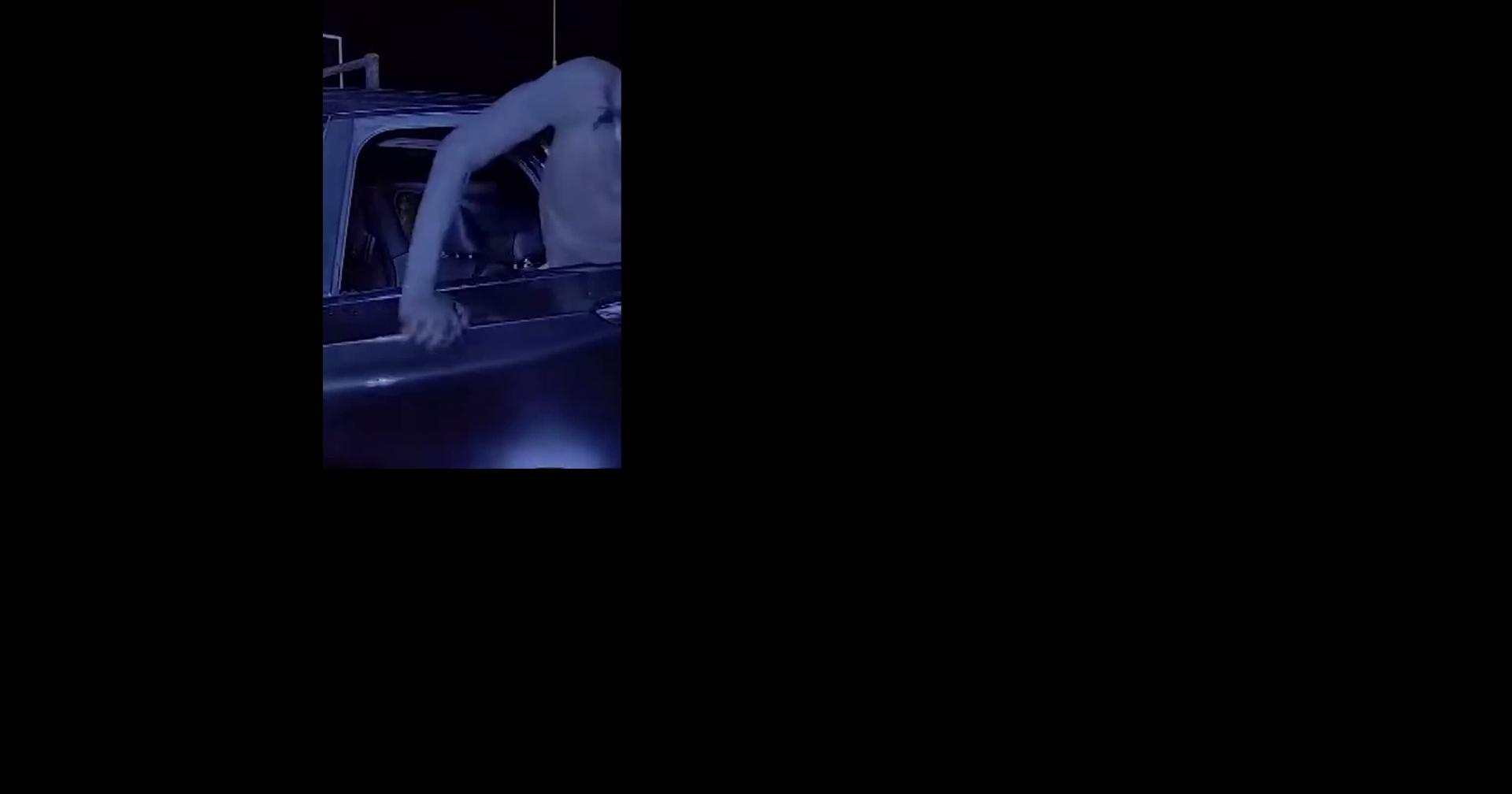 RAW: VERTICAL: OFFICER GRABS MAN'S LOCS DURING ARREST CLEAN
