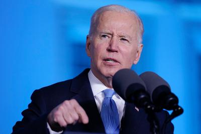 Biden says he was 'expressing my outrage' but not making a policy change when he said Putin 'cannot remain in power'