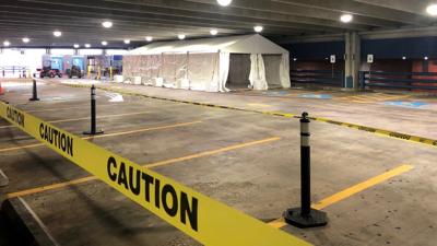 PHOTOS: Erlanger Hospital building alternative care sites in parking garage